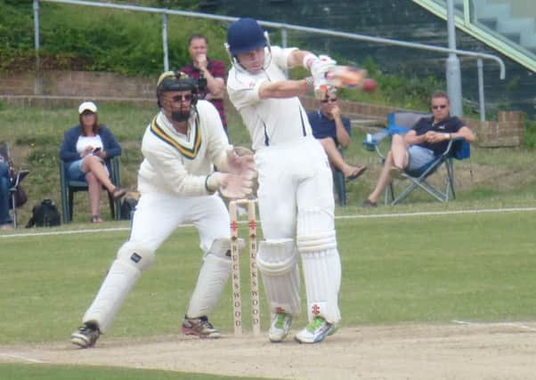 Leo Cammish executes a pull shot on his way to a magnificent century for Hastings Priory against Three Bridges. Picture by Simon Newstead