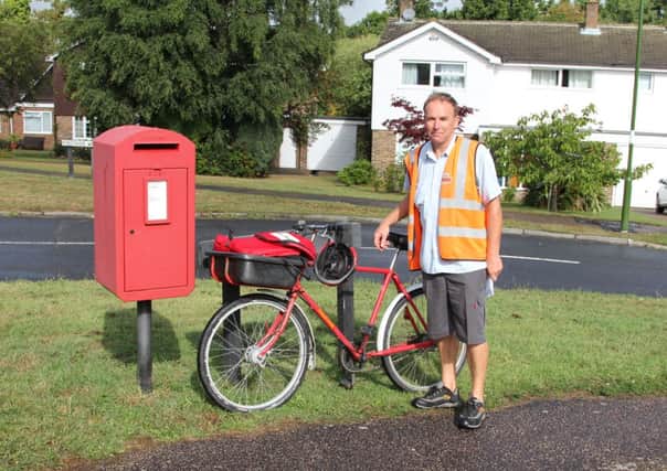 Postman Mark Griffin has served one community for 12 years