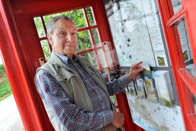 JPCT 130813 S13330493x North Stoke, old BT telephone box used as information centre. Peter Flatter  -photo by Steve Cobb
