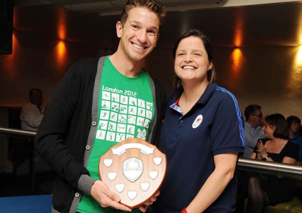 James Bellward, Littlehampton Sports Personality of 2012, receives his award from Olympic torchbearer Carrie Reynolds