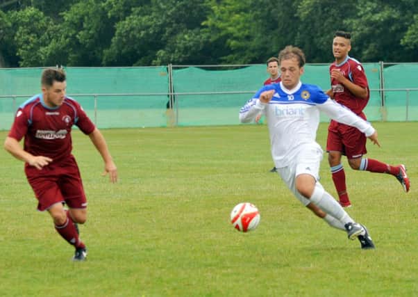 Action from Little Common's last gasp 2-1 win at home to Rustington on Saturday. Picture by Steve Hunnisett (eh34019a)