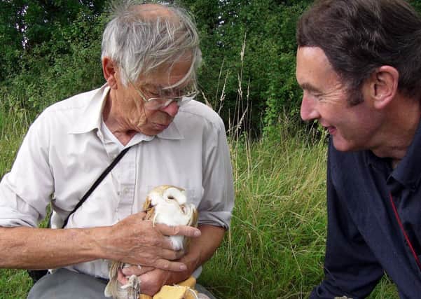 Licenced wildlife inspector Barrie Watson with Michael Nailard (pictured right)