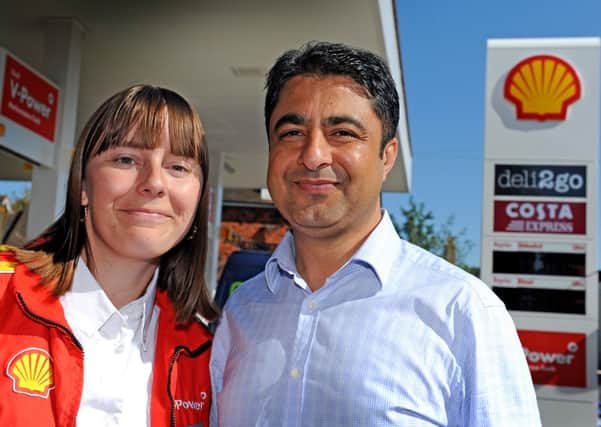 JPCT 190813 S13341037x Henfield. Shell garage re-built and re-opening. Leanne Barnard, site manager, and Mehdi Rizvi, retailer  -photo by Steve Cobb