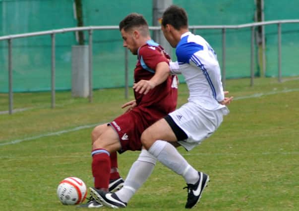 Action from Little Common's 2-1 win at home to Rustington on Saturday. Picture by Steve Hunnisett (eh34019d)