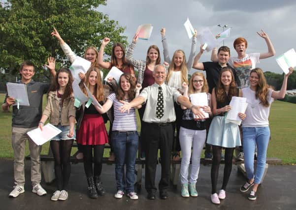 Departing head teacher Chris Taylor of Steyning Grammar School with GCSE pupils - photo by Maxine SIlver