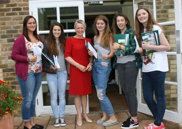 Some of the Farlington School's students receiving GCSE results this morning (submitted).