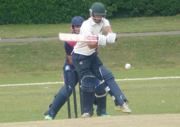 Callum Guest scored his maiden Sussex Cricket League century as Bexhill beat Goring-by-Sea to clinch promotion