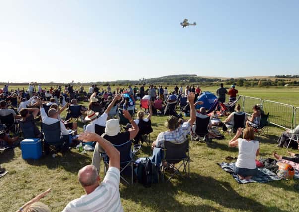 S36718H13 The Fairey Swordfish flies over the crowd at the RAFA Shoreham Airshow 2013