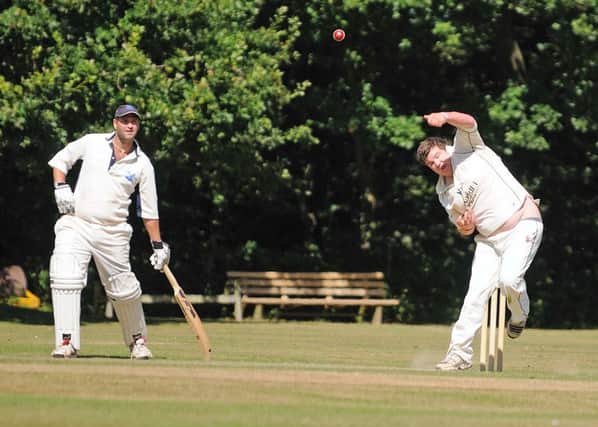 Ben Clifton bowls for Rye against Iden. Picture by Tony Coombes Photography (eh36601e)