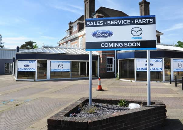 JPCT 040613 S13230658x Farthings Hill roundabout, BBH garage, new signage up saying Lifestyle Ford moving there -photo by Steve Cobb