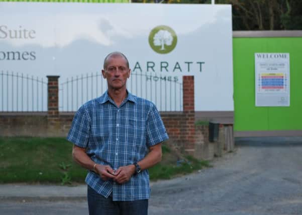 David Bishop who lives in Worthing Road, outside his home opposite the new Barratt Homes development (submitted).