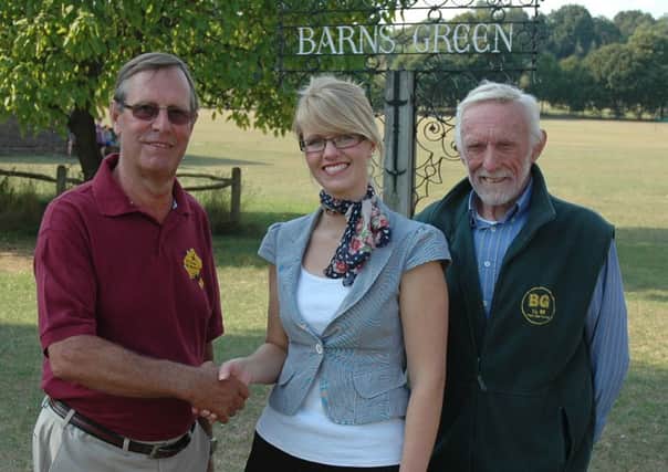Janine Leadbeater, Head of Marketing, Berkeley Homes pictured with Chris Simpson (vice Chairman) left and Vernon Jennings, (Chairman and Race Director) right, at the launch of Berkeleys sponsorship of the Barns Green Half Marathon on the village green