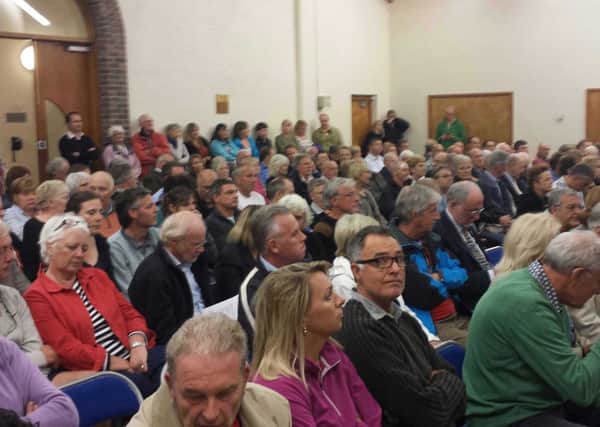 Hundreds packed out North Heath Hall to discuss proposals for 2,500 homes north of the A264 (JJP).