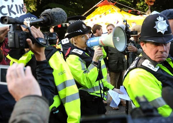 Announcement made to anti fracking protesters by police. Pic Steve Robards