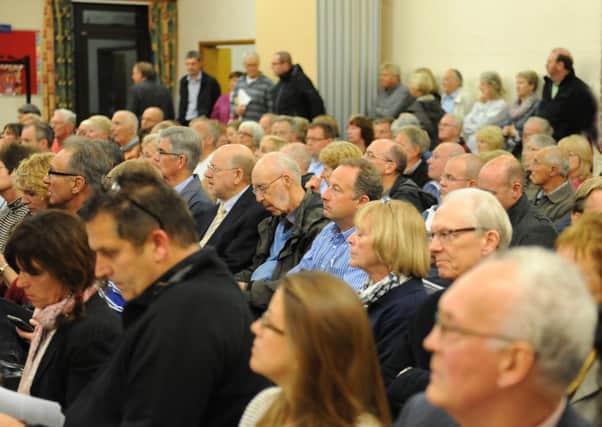 Residents packed out a meeting to hear about plans for 2,500 homes north of Horsham earlier this month. photo by derek martin