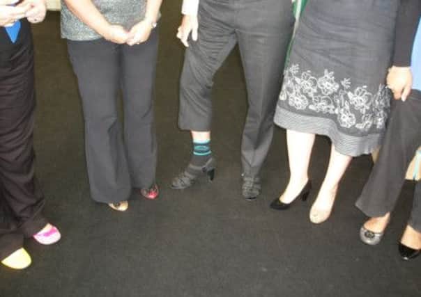 The footwear worn by staff at RG Solicitors who raised over £100 for Chestnut Tree House Childrens Hospice