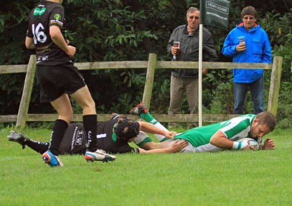 Rob Grantham-Hill crashes over for one of Horsham's six tries