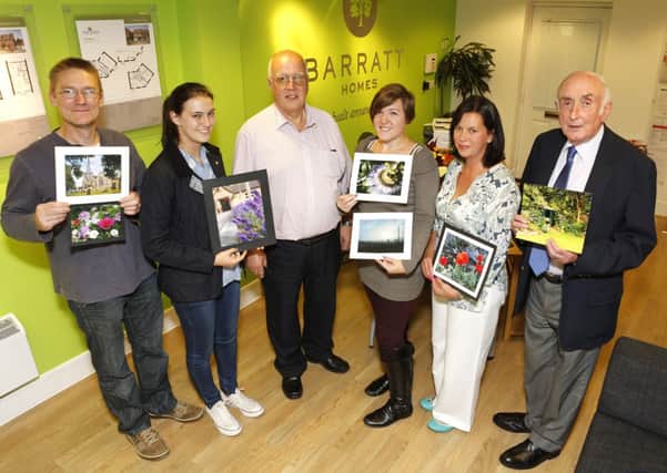 Horley in Bloom photo exhibition (L-R) Richard Cantwell, Addle Spicer, Mike George, Chairman Horley in Bloom, Kate Lamb, Catherine Robertson and Jim Williamson