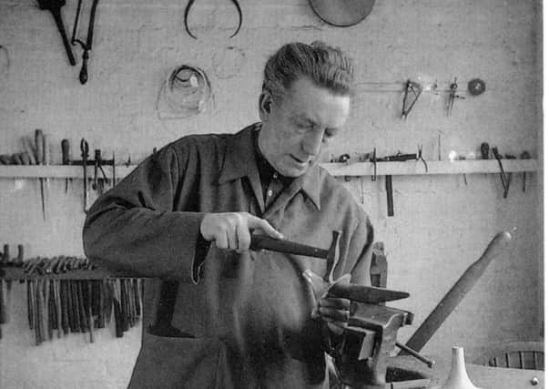 Dunstan Pruden in his workshop in 1957