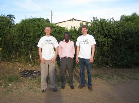 Virtual Doctors -   Phil Mustardé and Huw Jones with a client in Zambia