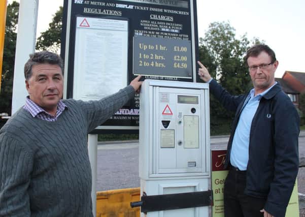 Battle Mayor, Cllr Richard Bye, with Cllr Clive Bishop take issue with Rother District Council's parking policy