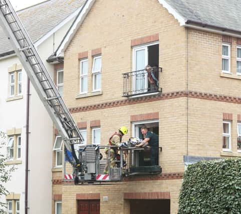 WEST SUSSEX FIRE & RESCUE TAKE LADY FROM FIRST FLOOR WINDOW DOWN TO THE GROUND FLOOR USUNG THE AERIAL LADDER PLATFORM AT 11.00 AM THIS MORNING ,JUST BEFORE THE FOUR HOR STRIKE FROM NOON UNIL FOUR PM TODAY