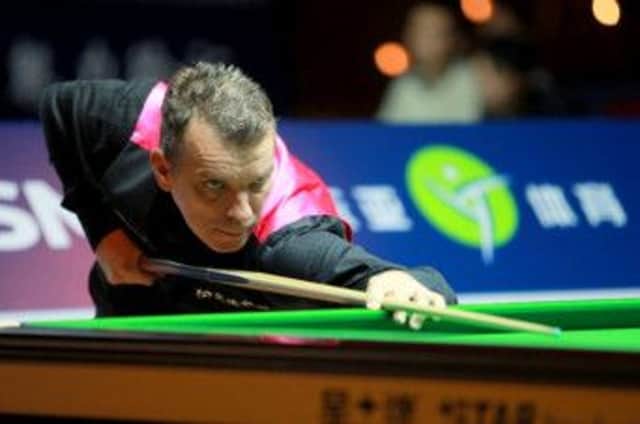 Mark Davis in action at the Shanghai Masters snooker tournament. Picture courtesy Tai Chengzhe, World Snooker