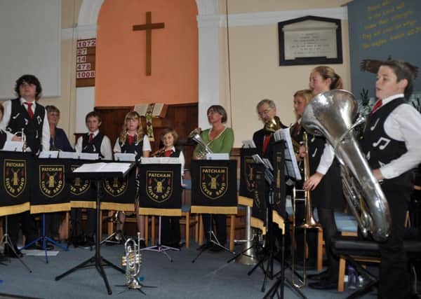 Patcham Silver Youth Band take applause during a concert at Henfield Free Church for the Friends of St. Barnabas Hospices