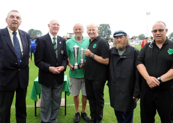 Brian Quinnell receives the groundsman of the year trophy at a recent game   Picture by Kate Shemilt.C131189-1