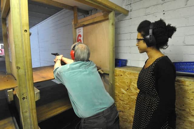 25/9/13- 1066 Rifle and Pistol Club- for feature.  Bob Fox introduces  Hannah Collison to black powder pistols
