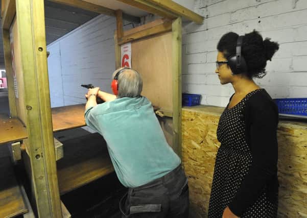 25/9/13- 1066 Rifle and Pistol Club- for feature.  Bob Fox introduces  Hannah Collison to black powder pistols
