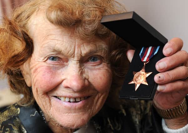 JPCT 011013 S13391599x Peggy Weeks, Steyning. Arctic Star medal - photo  by Steve Cobb