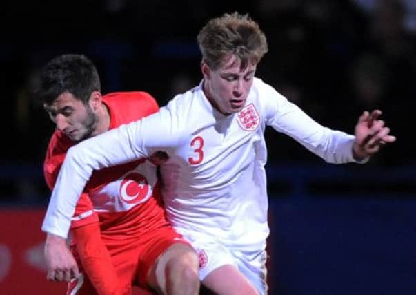 Adam Webster in action for England