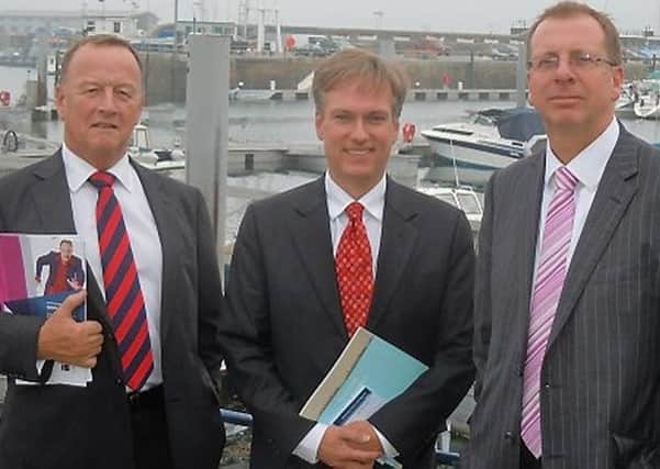 Henry Smith and Jeremy Taylor with Barry Cash of the Guernsey Chamber of Commerce