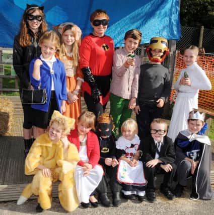 L41387H13 Children at Arundel CofE Primary School dress up as Superheroes for Book Week.