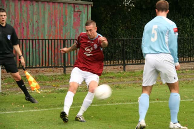 Kenny Pogue, pictured crossing the ball in Saturday's win over Brentwood Town, scored Hastings United's final goal in the 3-0 victory at home to Folkestone Invicta tonight. Picture by Terry S. Blackman