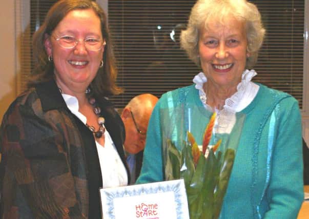 Liz Roe, scheme manager, left, and Margaret Turner, home-visiting volunteer, who received a long service award for volunteering for five years.