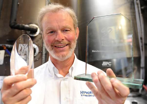 JPCT 071013 Andy Hepworth of Hepworth brewery with Business matters awards. Photo by Derek Martin