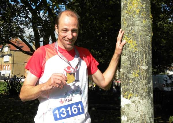 Jason Ponting with his Royal Parks Foundation half-marathon medal