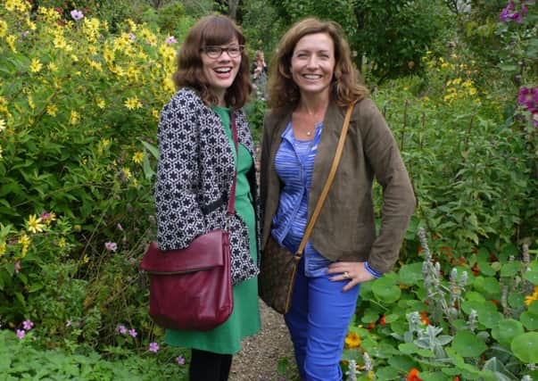 Sally Pavey, volunteer organiser, with author Bethan Roberts in the gardens at Charleston House