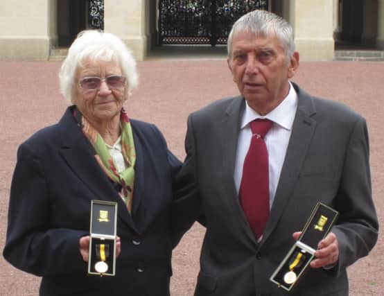 Margaret & Ken Cherry, of Little Common Football Club, receive special awards at Buckingham Palace