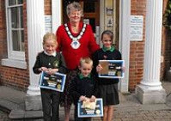 Town Mayor Margaret Belsey. with winners Alex, Alice and Conor.