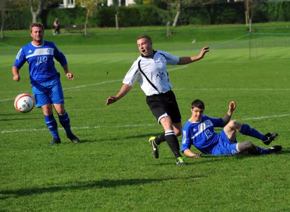 Action from Bexhill United's 5-0 win at home to Midhurst & Easebourne. Picture by Steve Hunnisett (eh42009f)