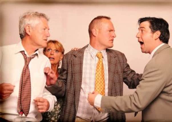 Biff (Guy Steddon) confronts Willy (Bob Ryder), watched by Happy (Phil Brown), centre, and Linda (Pam Luxton) in the stand-out scene of Wick Theatre Company's Death of a Salesman