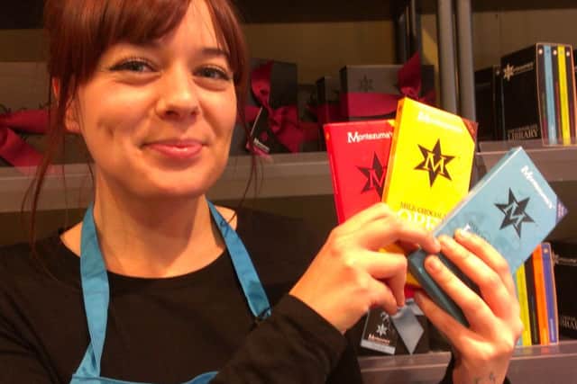 Carrie Burton, area manager, with a selection of Montezuma's chocolate
