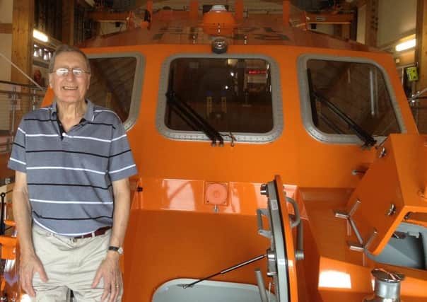 Richard Tookey on board the Shoreham all-weather lifeboat Enid Collett during his recent visit