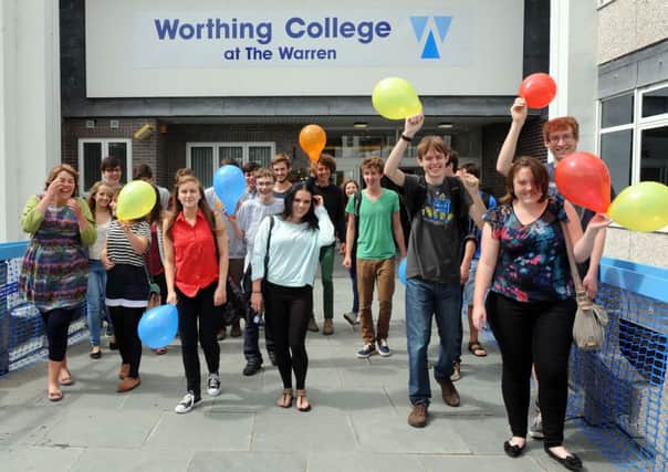 W34604H13  Students celebrating A level results at Worthing College's new site