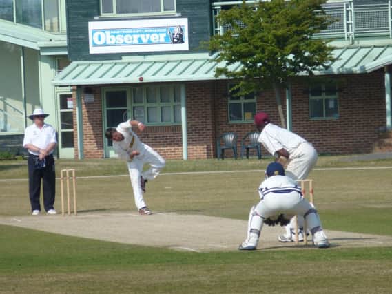 Elliot Hooper bowls for Hastings Priory against Preston Nomads during the summer. Picture by Simon Newstead