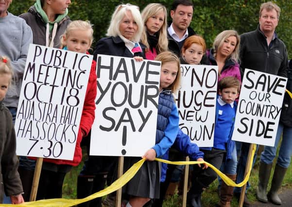 Wineham yellow ribbon demo against proposed new town in the area. Pic Steve Robards