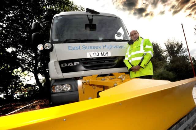 Roger Williams (Head of Highways) pictured with a gritter, Ringmer Depot. 11/10/13